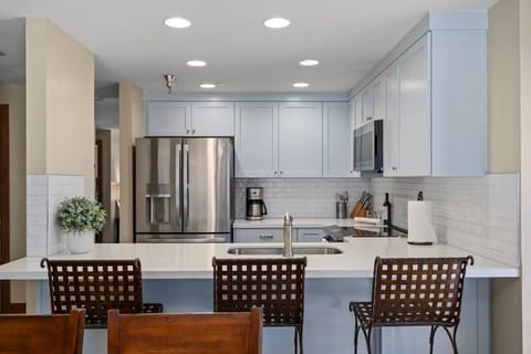 Kitchen: Fully equipped with modern, stainless appliances.