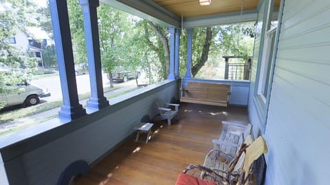 Front porch with swinging bench