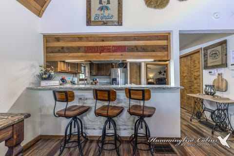 Nestle up to the breakfast bar and enjoy conversations with the 'cook in the kitchen'