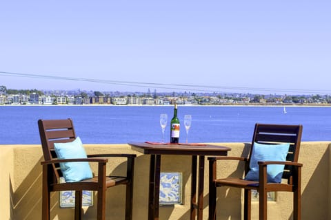 Enjoy the beauty of the expansive view from this high table on the rooftop deck

