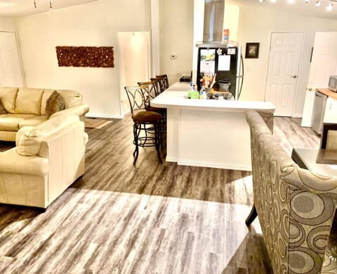 Living room, dining table & kitchen 