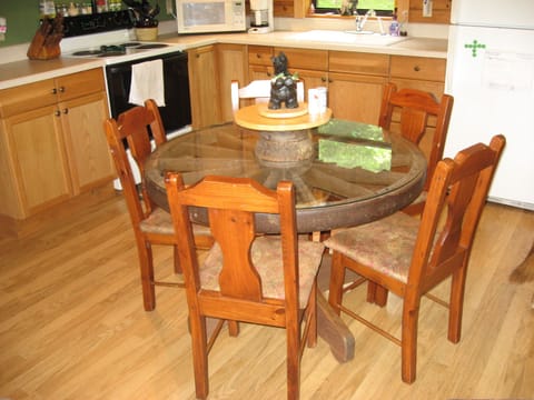 Wagon wheel table w/ glass top