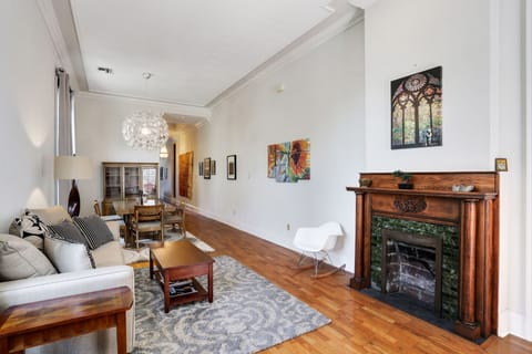 View upon entry: front living and formal dining areas. Original mantle.