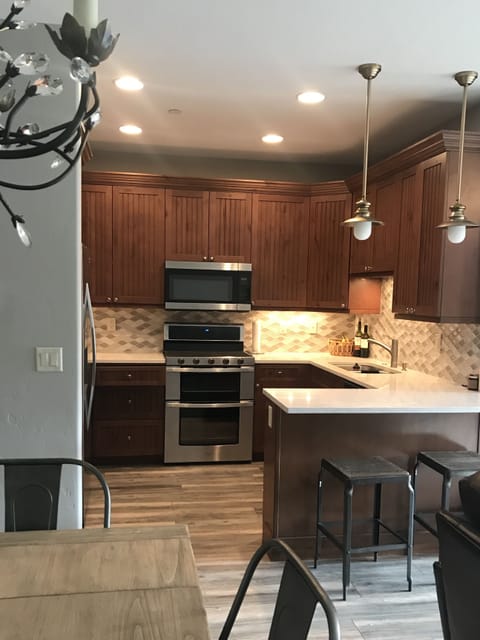 Open kitchen w/ everything you need to cook a great meal (and no excess clutter)