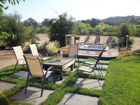 Outdoor seating area and hot tub