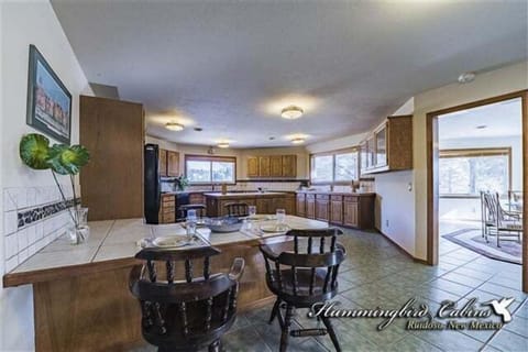 Over sized kitchen with a breakfast bar