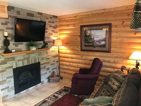 Newly renovated living room with electric logs. Queen sleeper sofa.

