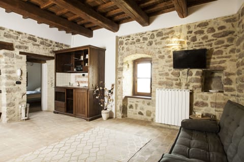 Deluxe Apartment, 2 Bedrooms | Living area | Flat-screen TV