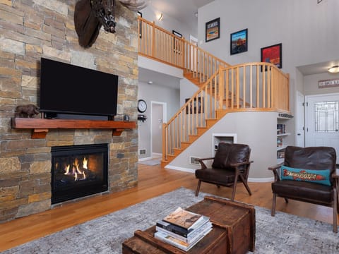Living Room w/ Flat Screen TV and Propane Fireplace