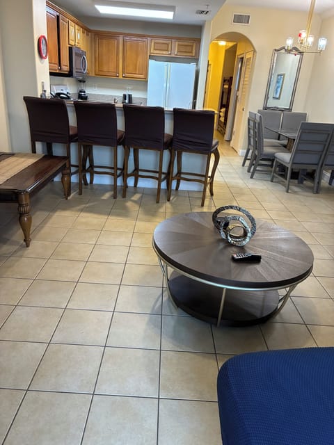 Combo dinning room and kitchen with high seat and dinning area