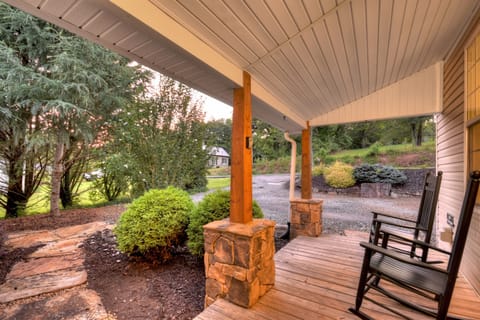 Start your day in a rocking chair with coffee in hand and end it watching the sun dip behind the trees—just minutes from the heart of downtown Blue Ridge, but worlds away in feel.