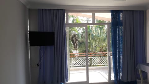 Basic Triple Room, Private Bathroom | Television