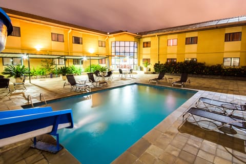 Outdoor pool, open 9:00 AM to 10:00 PM, sun loungers