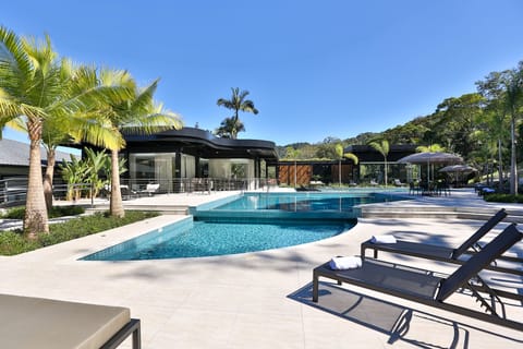 3 outdoor pools, open 6 AM to 10 PM, pool umbrellas, sun loungers