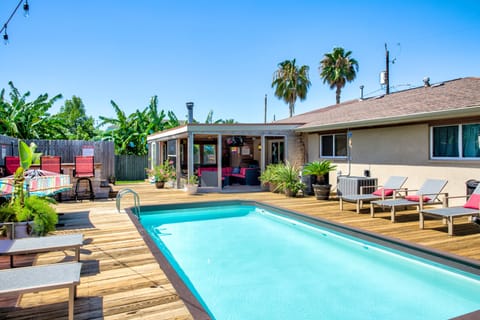 12’ x 24’ swimming pool, hot tub, billiards table, covered outdoor living area