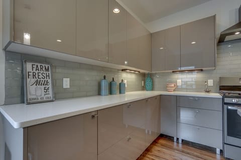 Plenty of cabinet space with imported cabinets from Italy. Soft touch close.