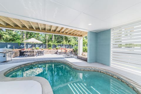 Heated pool with a huge outdoor area with everything you could want