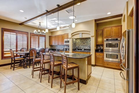 Center island with bar stools.