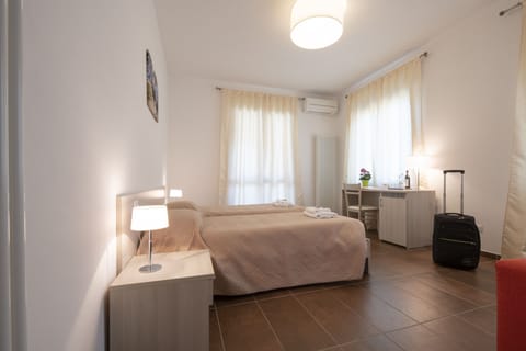 Triple Room, Multiple Beds | Free cribs/infant beds, free WiFi, bed sheets