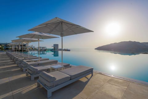 Indoor pool, outdoor pool, pool umbrellas, sun loungers