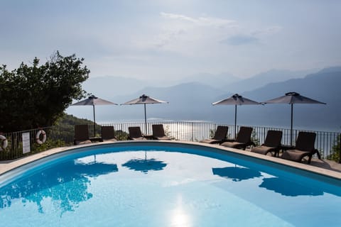 Outdoor pool, open 9:30 AM to 7:30 PM, pool umbrellas, sun loungers