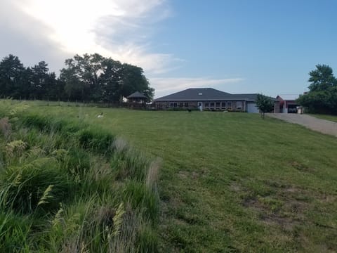 Charming acreage away from traffic, but near all the amenities.  