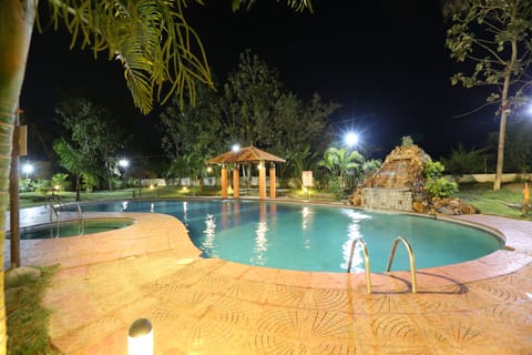 Outdoor pool, open 9:00 AM to 6:00 PM, sun loungers