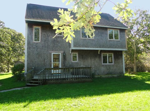 Front of house and front yard. Kind of plain outside, but come see the inside!