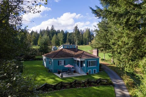 The spacious yard surrounding offers serenity or a place for the kids to play.