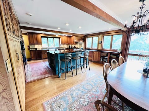 Kitchen and breakfast bar opens up to dining room