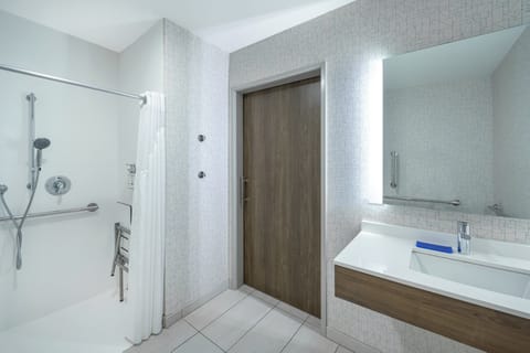 Eco-friendly toiletries, hair dryer, towels