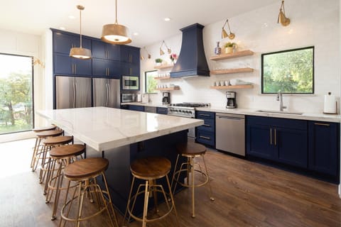 plenty of room to relax around the beautiful custom island with 10 bar stools!