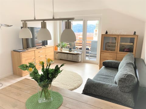 centrally located, modernly furnished 2 rooms apartment (64 m²) | Living area | Flat-screen TV