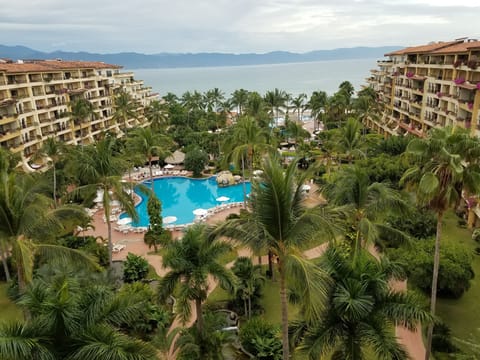 View of Ocean, 3 pools, and K ids Play area