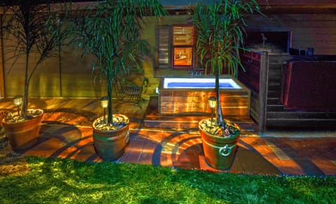 Outdoor soaking tub and shower