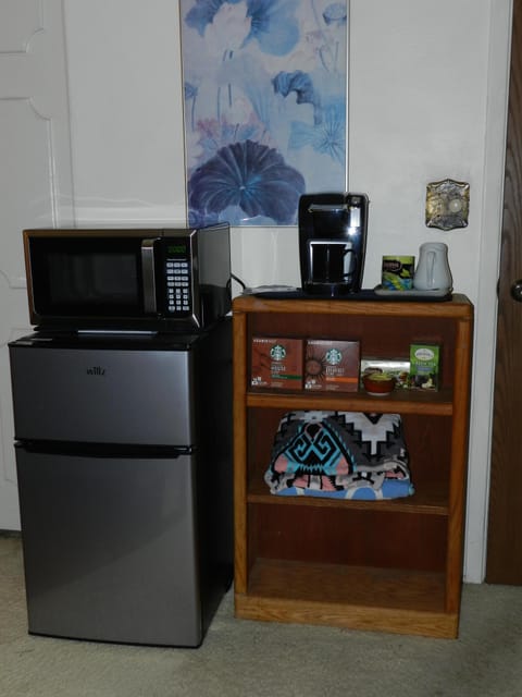 Frig, microwave, coffee maker and supplies, towels for pool