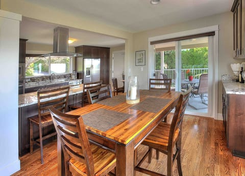 Eating area off of kitchen facing Olympic Mts & Puget Sound