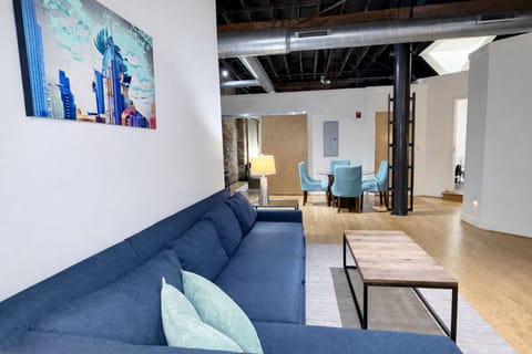 Spacious living room with queen sleeper sofa.