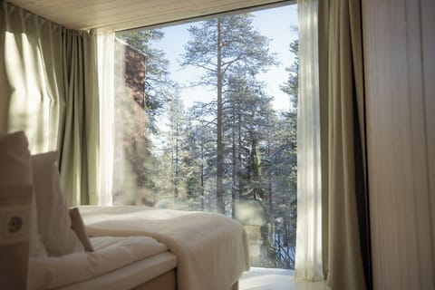 Arctic Treehouse Suite Double and View | Premium bedding, minibar, in-room safe, blackout drapes