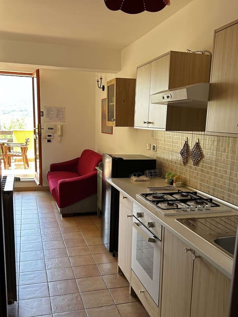 Apartment, 1 Bedroom, Lake View | Private kitchen | Oven, cookware/dishes/utensils