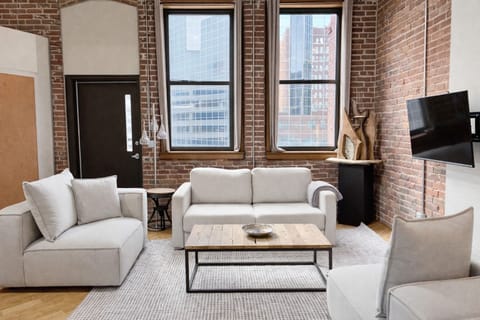 Living room with queen sleeper sofa.