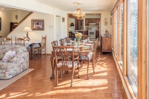 Formal dining table is just off the kitchen for easy serving