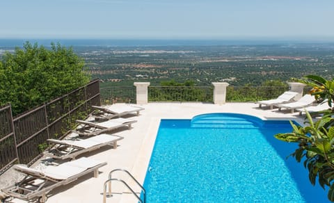 Private heated 8m x 5m pool with sun terrace and panoramic sea views
