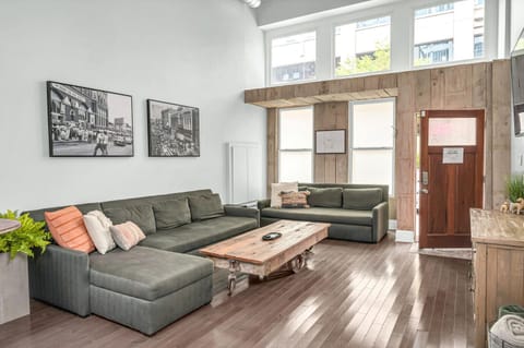 Spacious living room with two luxury queen sleeper sofas to sleep 4 guests