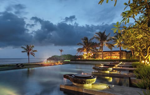 Outdoor pool, open 7:00 AM to 7:00 PM, free cabanas, pool umbrellas