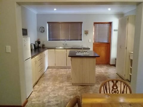 Comfort Cottage, 3 Bedrooms | Private kitchen | Full-size fridge, microwave, toaster, cookware/dishes/utensils
