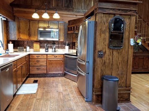 Kitchen has Corian counters, beaten copper sink, Keurig, and all the amenities!