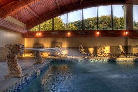 Indoor pool, seasonal outdoor pool, pool umbrellas