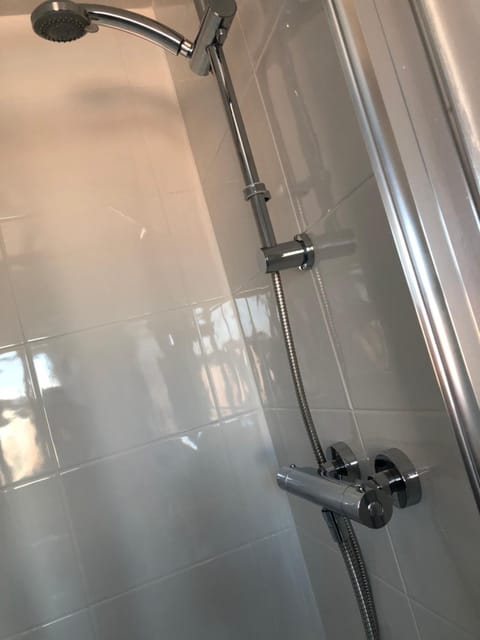 Shower, rainfall showerhead, towels