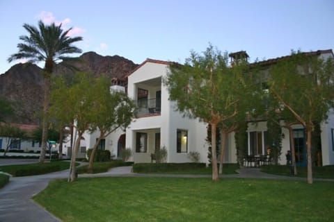 Front Entrance with Access to Manicured Front Lawn from Living Room and Bedroom